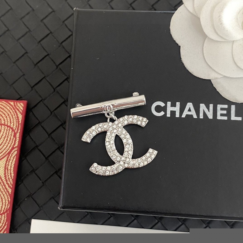 Ch*el brooches